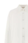 the zimmermann valiant lace tunic shirt redefines classic tailoring through a st