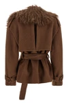 the giuseppe di morabito short coat redefines the codes of outerwear through bol