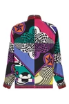 the versace shirt stands out as an exercise in sartorial precision and graphic i