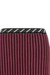 versaces crochet mini skirt defines a contemporary approach to knitwear