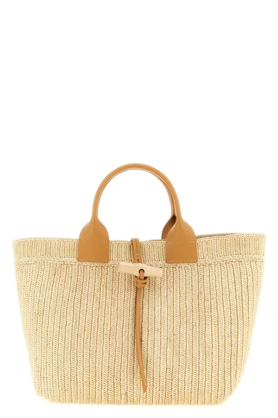 l le roseau shopping bag made from a single hand-woven raffia panel