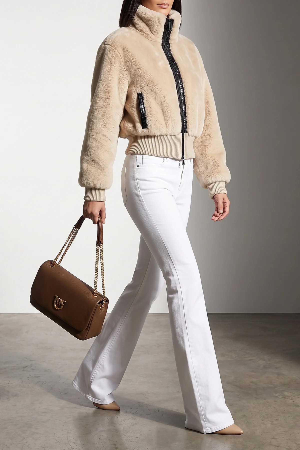 the pinko jacket redefines winter volumes through a structured crop silhouette