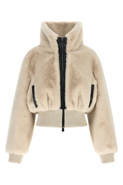 the pinko jacket redefines winter volumes through a structured crop silhouette