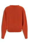 the v-neck sweater nude stands out for its pure cashmere construction that combi