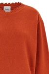 the v-neck sweater nude stands out for its pure cashmere construction that combi