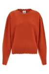 the v-neck sweater nude stands out for its pure cashmere construction that combi