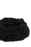 the accessory nude is distinguished by a sculptural knitting that recreates a de