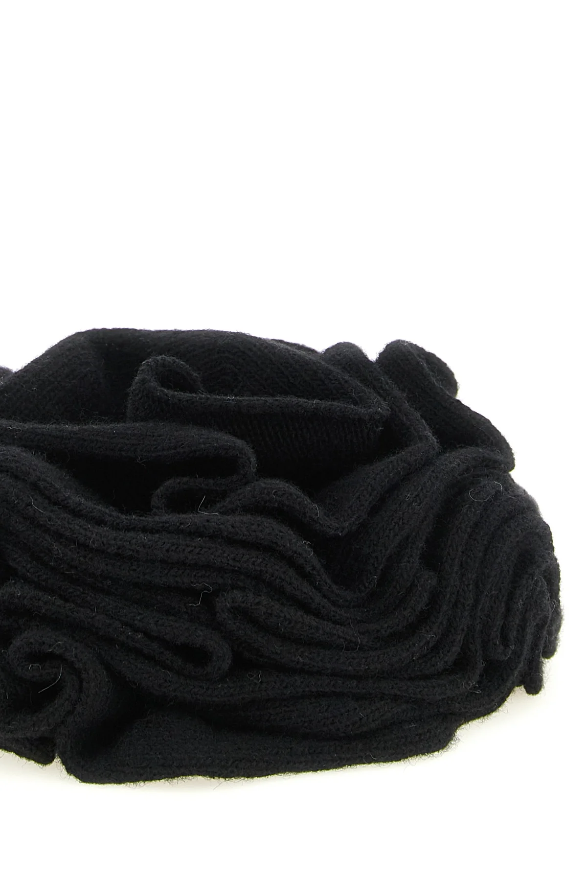 the accessory nude is distinguished by a sculptural knitting that recreates a de