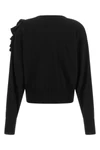 the (nude) knit redefines knitwear through an asymmetrical architecture of great