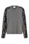 the nude knit redefines the elegance of knitwear through a bold material contras