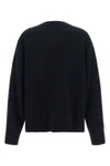 the nude knit redefines contemporary knitwear through a bold material contrast