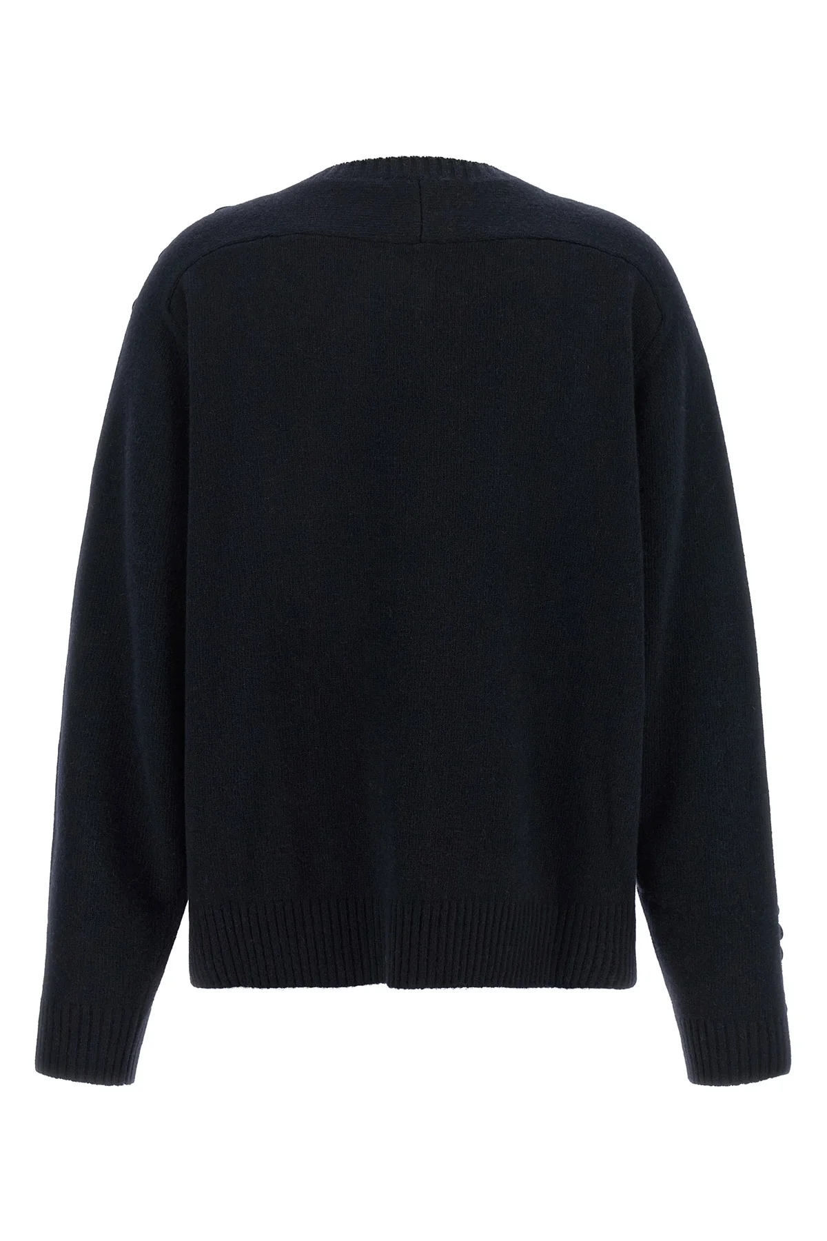 the nude knit redefines contemporary knitwear through a bold material contrast