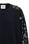 the nude knit redefines contemporary knitwear through a bold material contrast