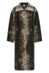 the nude coat redefines the volumes of contemporary outerwear through a straight