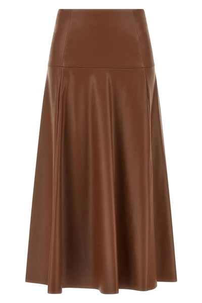 the midi skirt nude redefines the volumes of the contemporary wardrobe through a