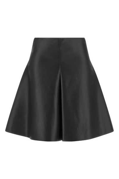 the nude mini skirt defines a flared silhouette