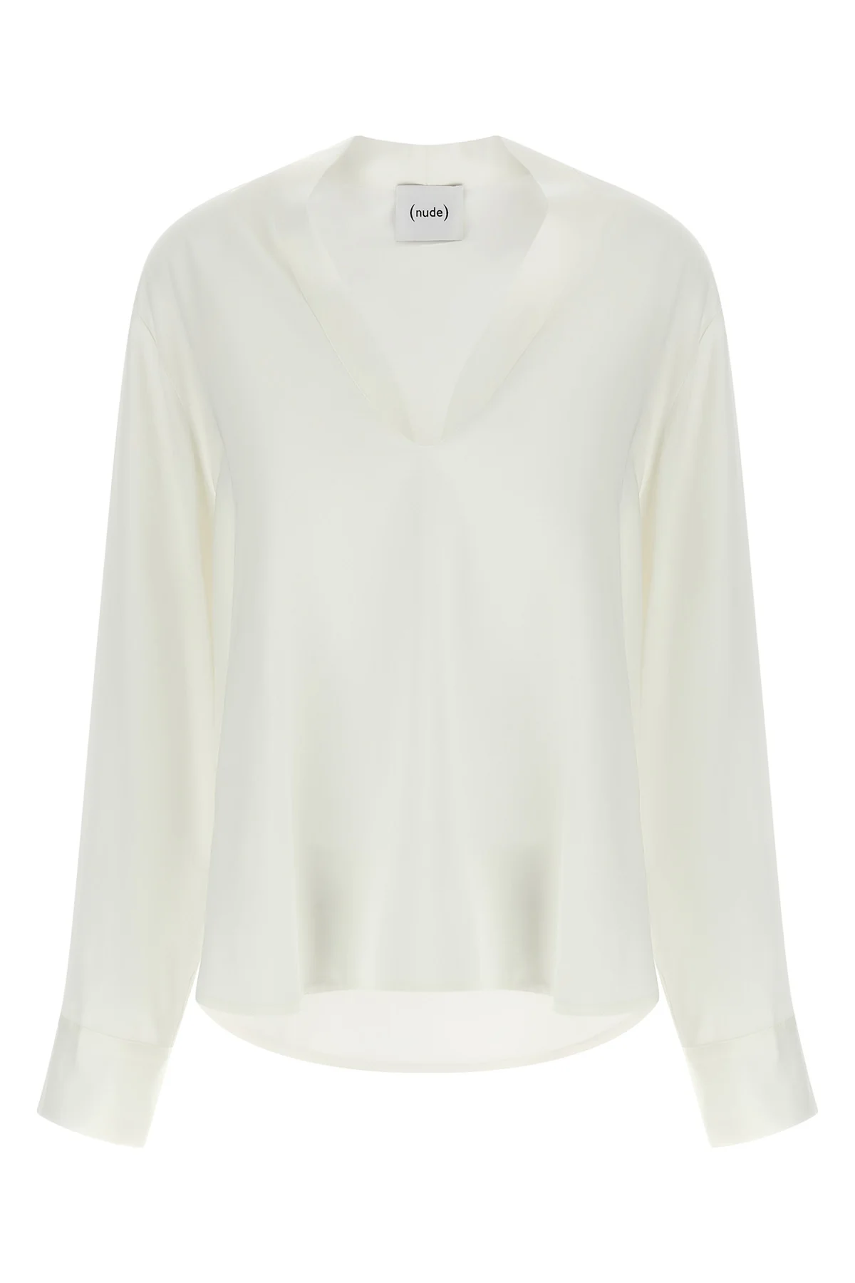 the nude blouse is distinguished by a fluid and deconstructed silhouette