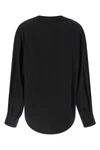(nudes) long-sleeved blouse redefines minimalist elegance through a fluid silho