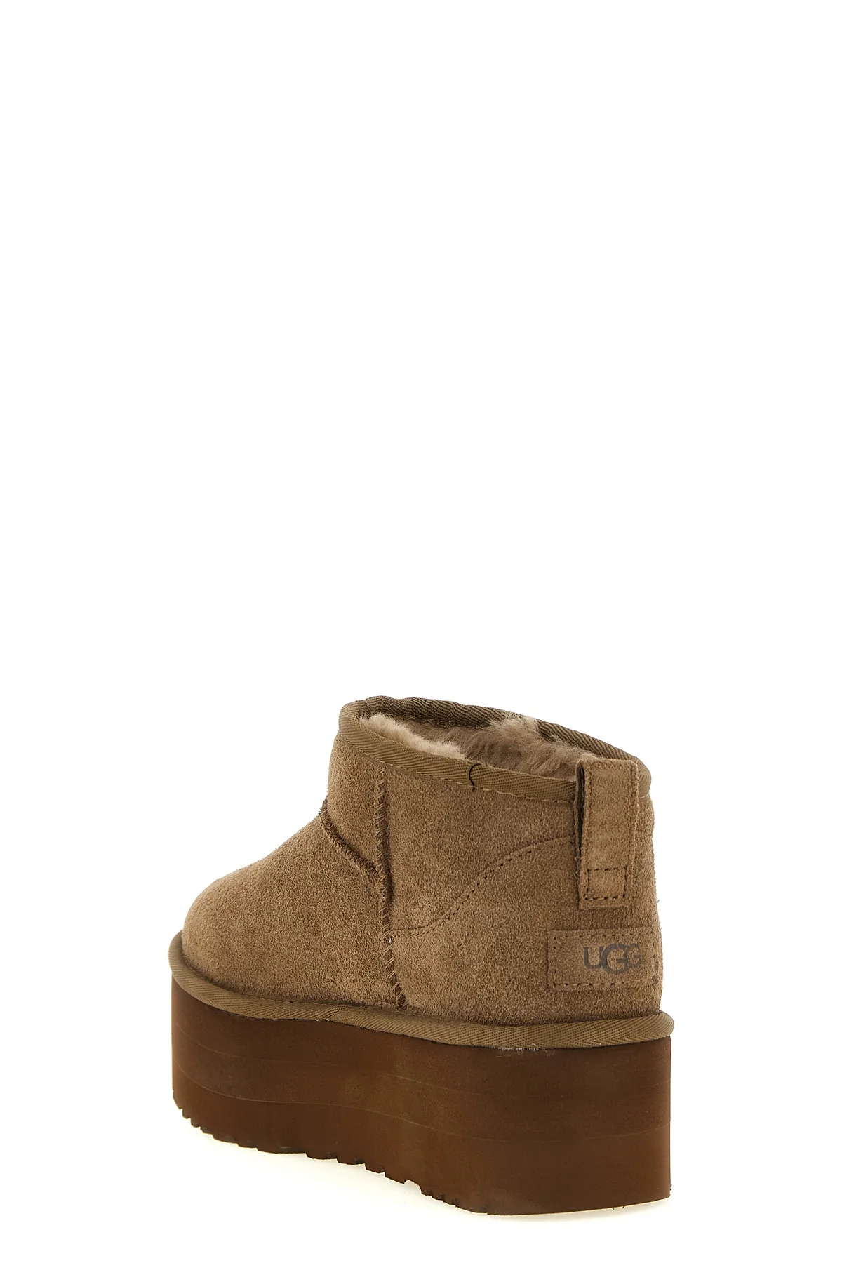 the ugg ankle boots redefine the brands iconic silhouette through bold proporti