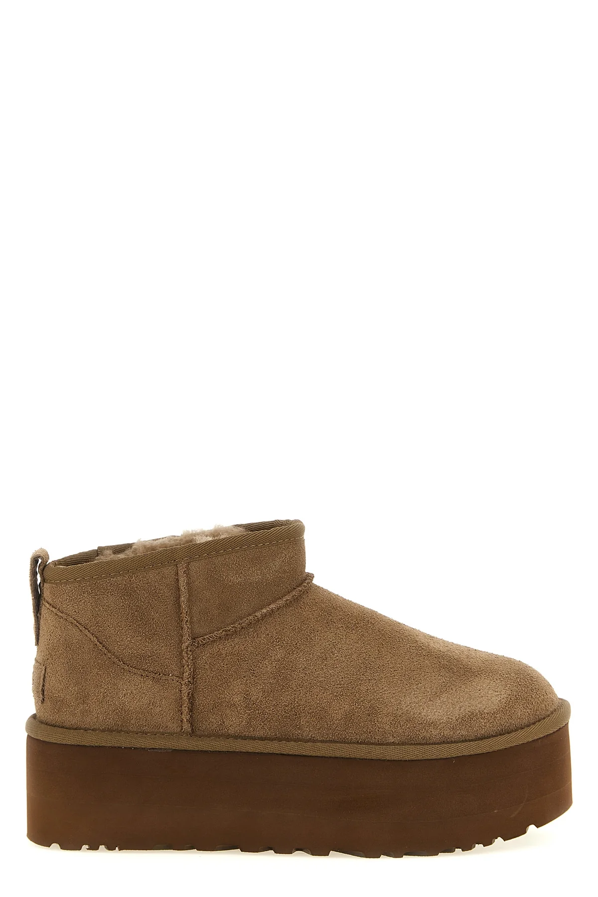 the ugg ankle boots redefine the brands iconic silhouette through bold proporti
