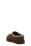 the sabot ugg sets new standards of comfort through a slip-on construction that