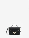 grained calfskin small rockstud crossbody bag
