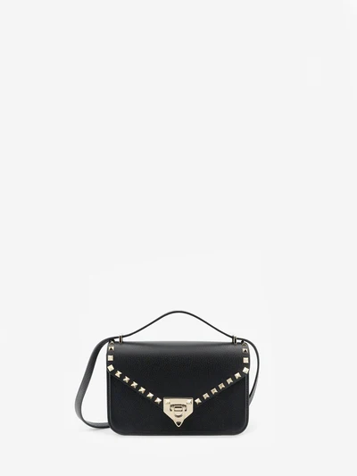 grained calfskin small rockstud crossbody bag
