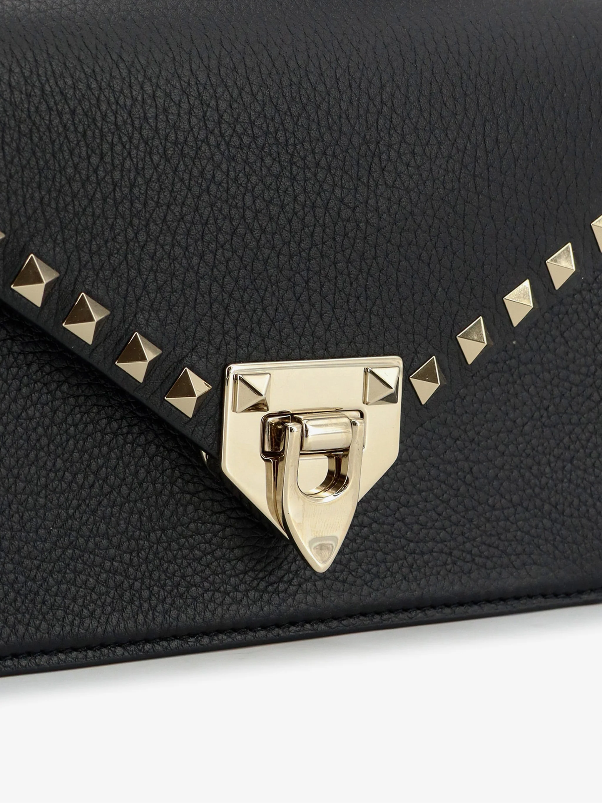 grained calfskin small rockstud crossbody bag