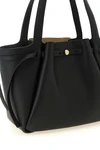 the tory burch romy tote bag defines everyday elegance through soft volumes and