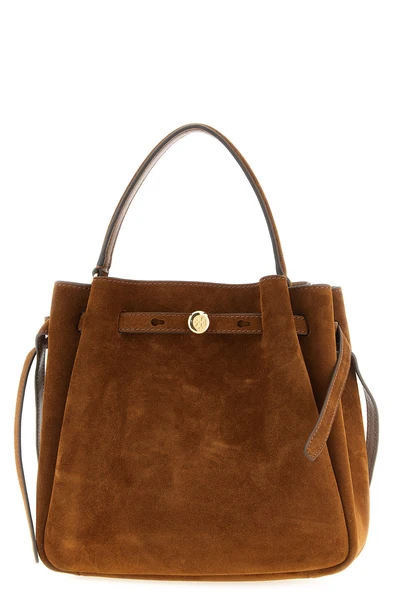 the tory burch romy bucket bag in fine caramel-colored suede stands out for a so