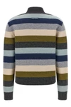 the tory burch turtleneck sweater defines the winter wardrobe through a rigorous