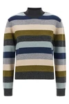the tory burch turtleneck sweater defines the winter wardrobe through a rigorous