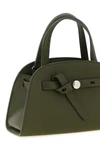 the tory burch romy small trunk bag embodies an elegance structured through a co