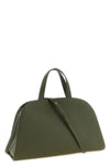 tory burchs romy top case handbag has a curved and structured silhouette