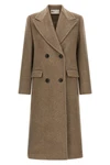 the tory burch coat defines a new concept of outerwear through sartorial volumes