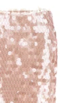 the tory burch skirt redefines the codes of the evening through a complex materi