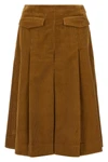 the pleated tory burch midi skirt defines a new concept of volume through a rigo