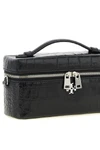 the tory burch charlie vanity case defines a structured silhouette