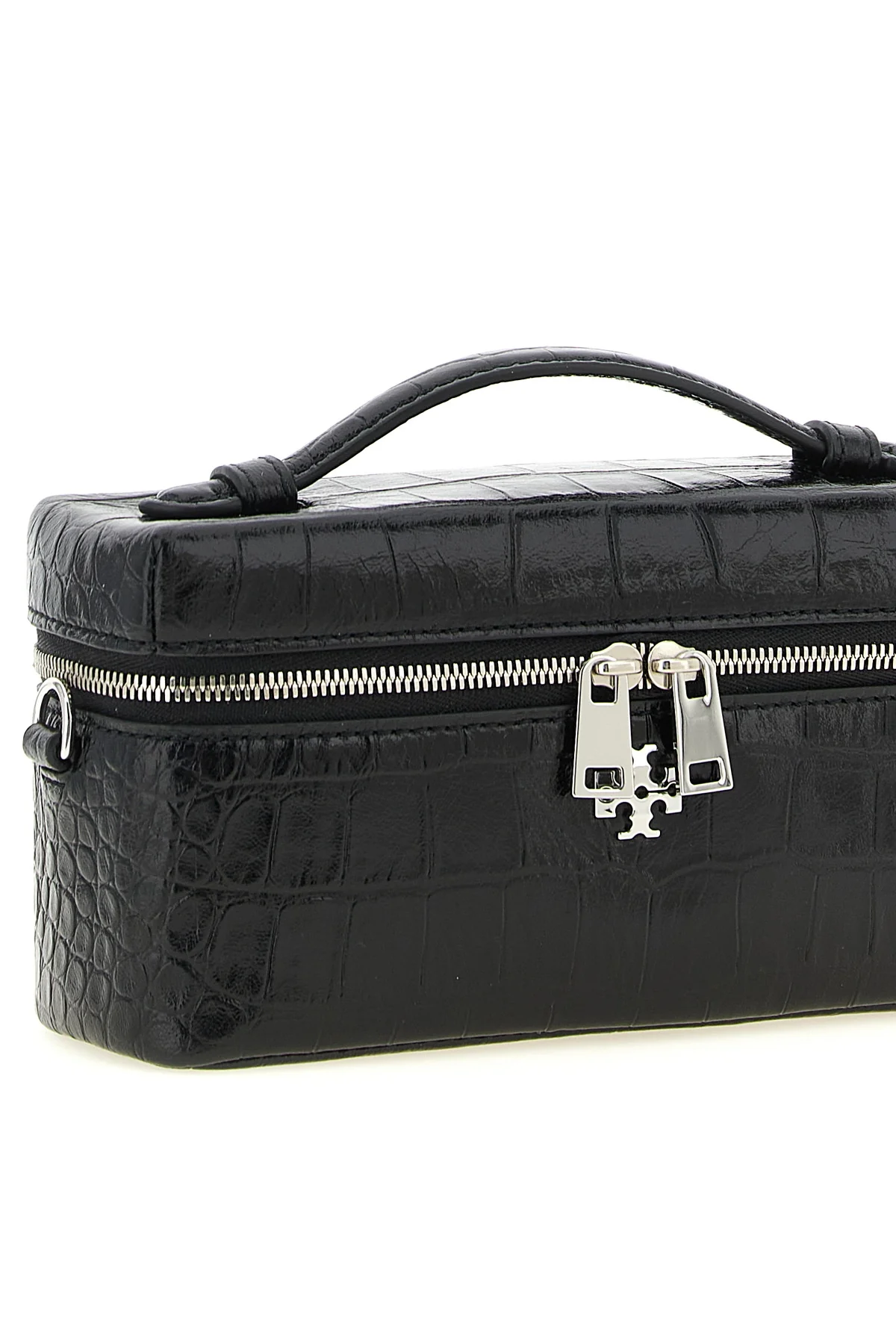 the tory burch charlie vanity case defines a structured silhouette