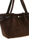 the tory burch romy tote bag embodies structured elegance through a clever pla