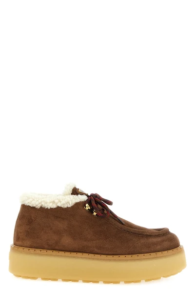 prada lace-up shoes blend a utility aesthetic