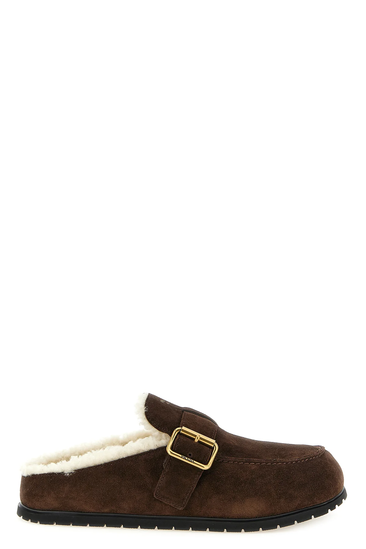 the prada sabot redefines informal luxury through a meticulous slip-on silhouett