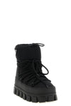 prada snow boots redefine winter aesthetics through a voluminous silhouette and