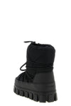 prada snow boots redefine winter aesthetics through a voluminous silhouette and
