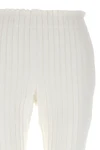 pleated cotton pants at the front and ribbed pants at the back