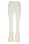 pleated cotton pants at the front and ribbed pants at the back