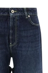 the blue cut-out stone-washed cotton denim jeans
