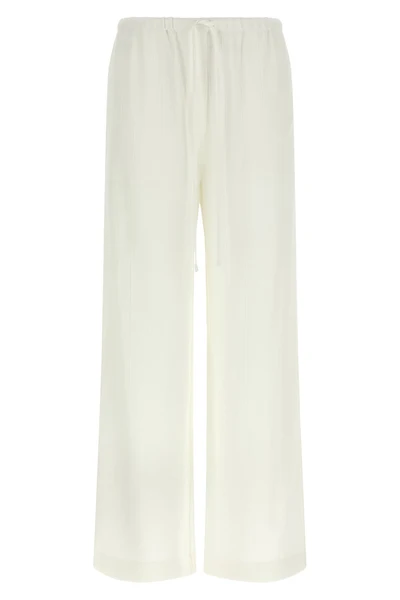 viscose and linen blend pants characterized by raised stripes