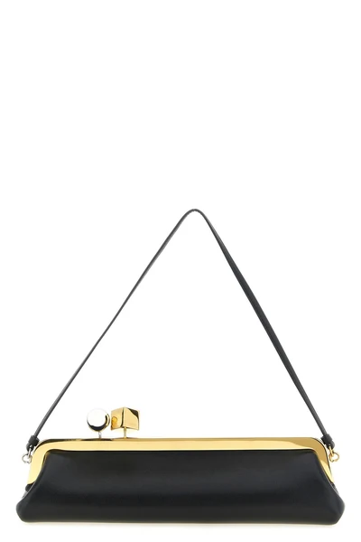 the jacquemus la pochette salon clutch redefines the codes of leather goods th