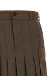 the sacai midi skirt redefines the codes of contemporary tailoring through a hyb